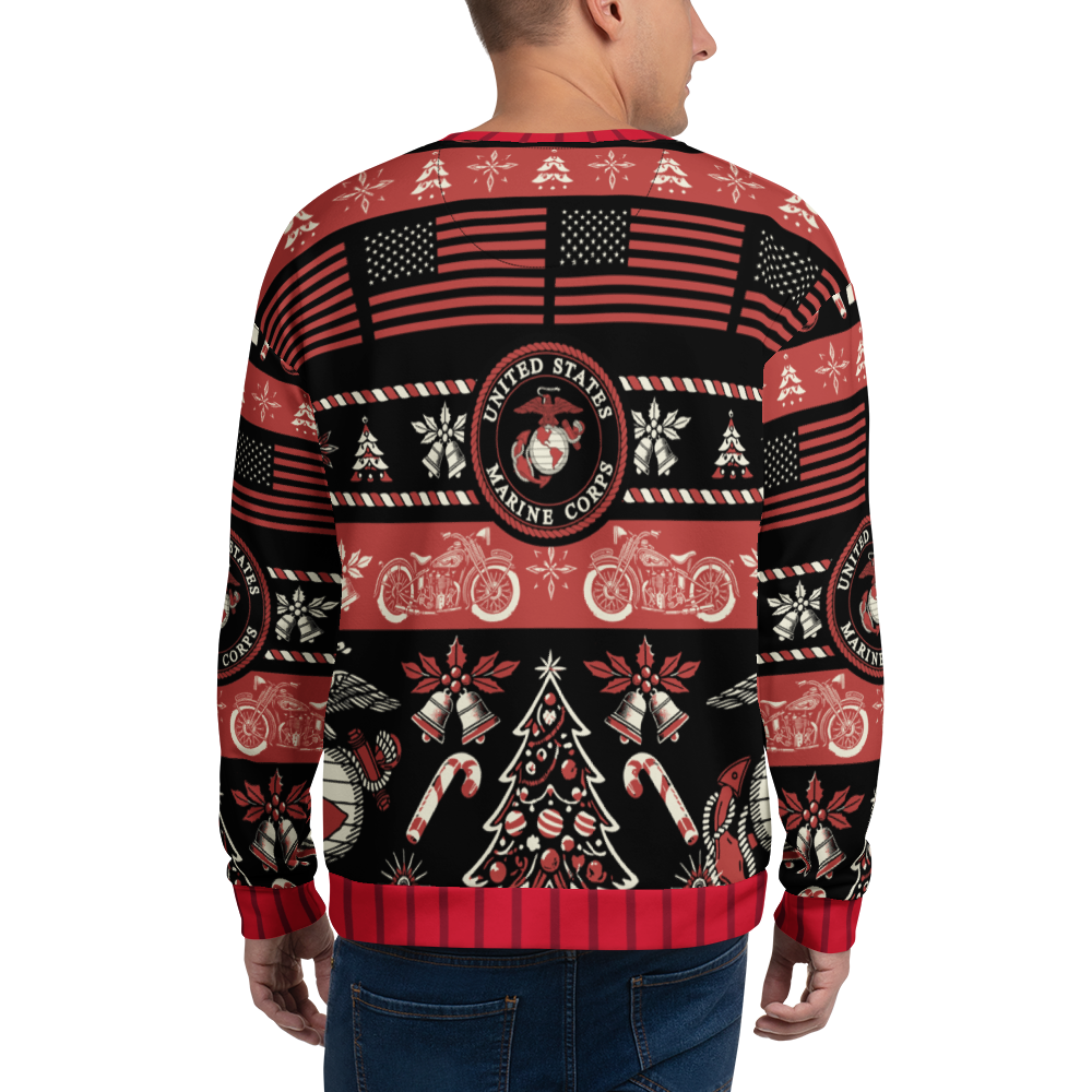 Person wearing a festive sweater with U.S. Marine Corps design on a white background
