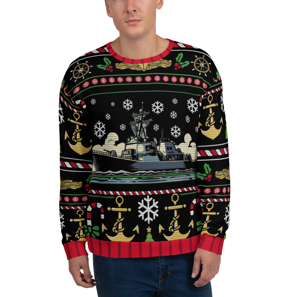 Person wearing a festive sweater with ship and anchor patterns on a white background