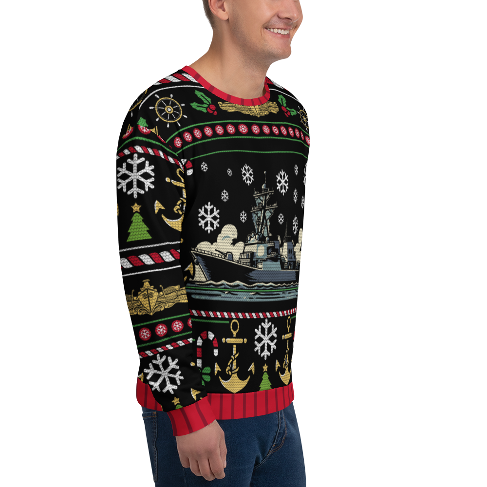 Person wearing a festive sweater with nautical patterns on a white background