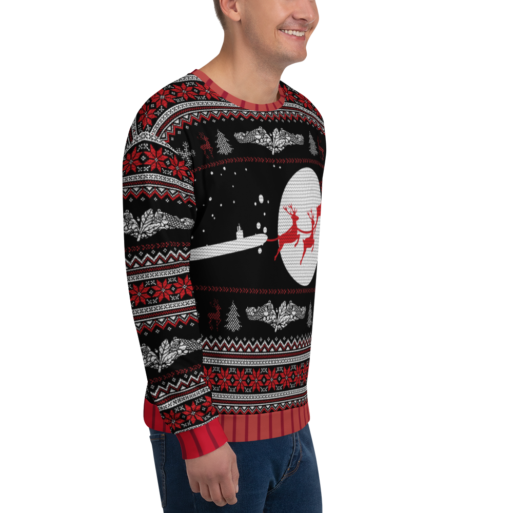 Person wearing a festive sweater with reindeer and snowflake pattern on a white background