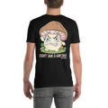Person wearing a black t-shirt with a cartoon mushroom character and text on the back.