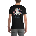 Person wearing a black t-shirt with a unicorn graphic and 'sparkle with joy' text.