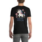 Person wearing a black t-shirt with a unicorn graphic and 'sparkle with joy' text.