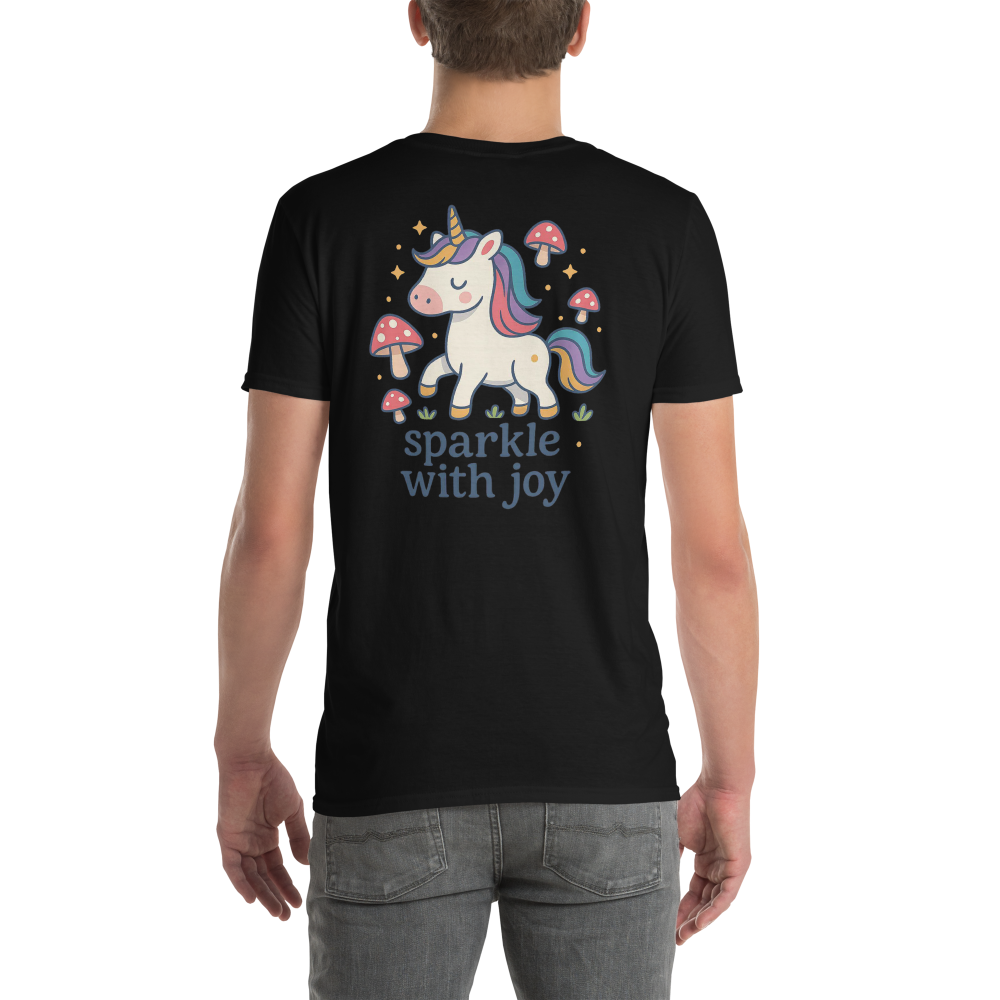 Person wearing a black t-shirt with a unicorn graphic and 'sparkle with joy' text.