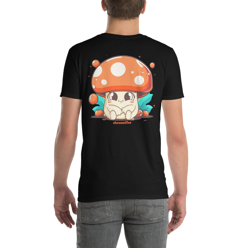 Person wearing a black t-shirt with a cartoon mushroom design on a white background