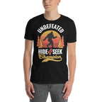 Person wearing a black t-shirt with a graphic design featuring a silhouette of a person in a forest and text.