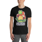 Person wearing a black t-shirt with a colorful graphic of a frog and mushroom and text 'Leap into the Unexpected'.
