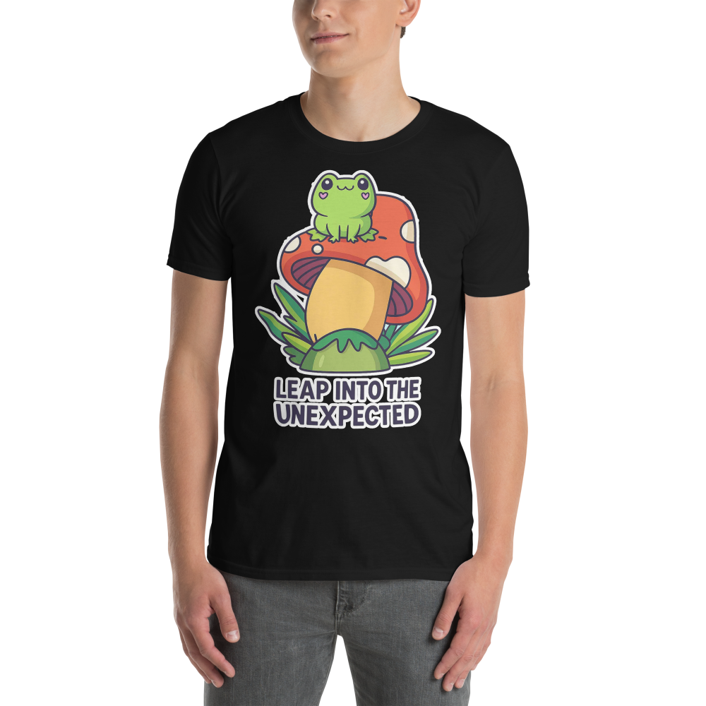 Person wearing a black t-shirt with a colorful graphic of a frog and mushroom and text 'Leap into the Unexpected'.