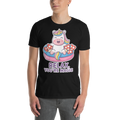 Person wearing a black t-shirt with a cartoon unicorn design and 'Relax, You're Magic' text.