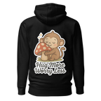 Black hoodie with a cartoon monkey and mushroom design on the back, featuring the text 'Hug More Worry Less'.