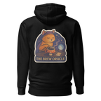 Black hoodie with a cat-themed graphic and 'The Brew Oracle' text on the back.