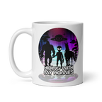 Mug with alien and UFO design on a white background