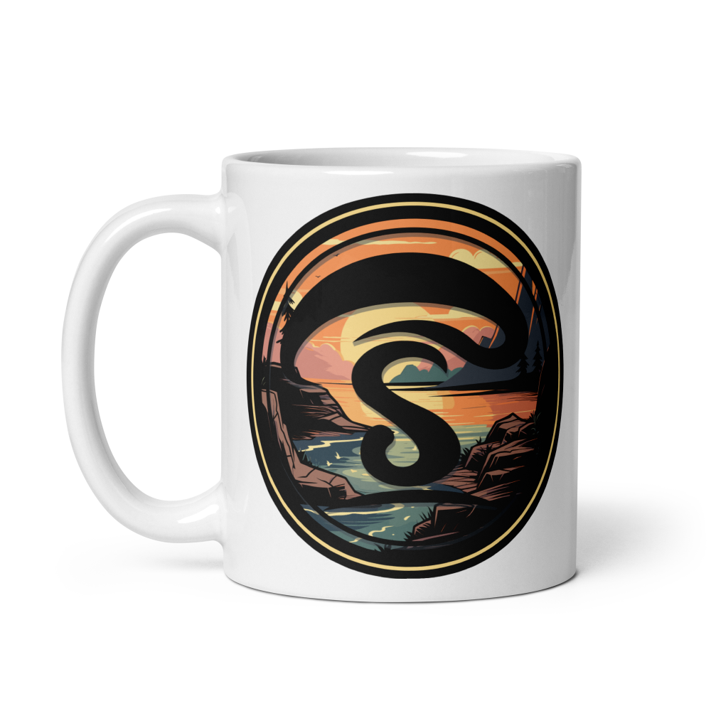 White mug with a decorative design featuring a stylized letter 'S' and landscape.