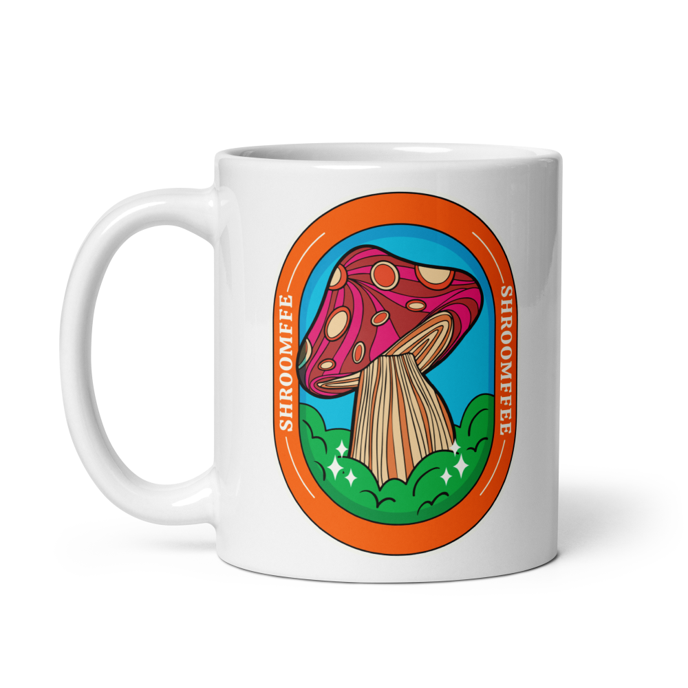 White mug with a colorful mushroom design and 'SHROOMEEF' text on a white background