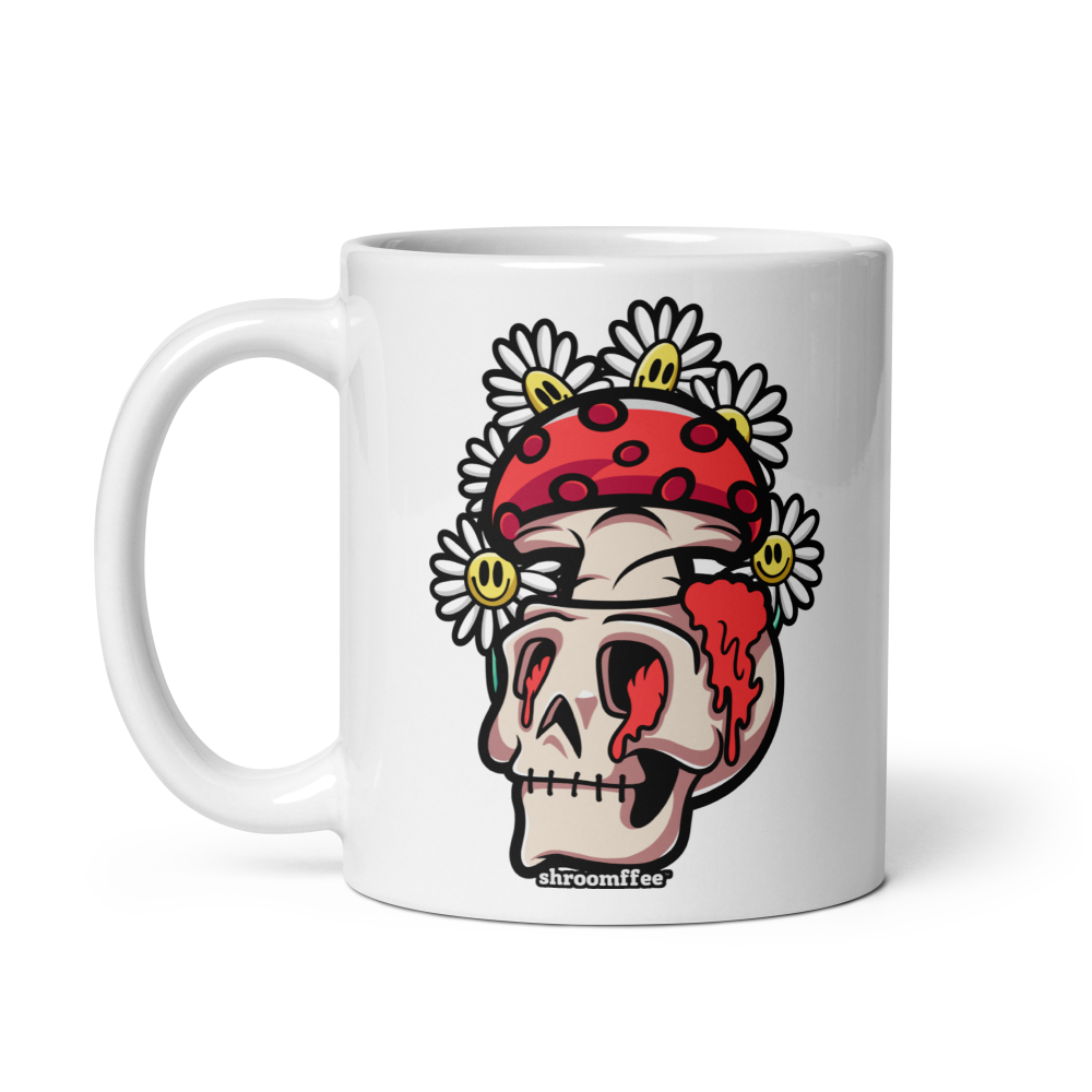 White mug with a skull design wearing a red bandana and flowers on a white background