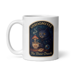 White mug with a cat and mushroom design labeled 'Shroomffee The Brew Oracle' on a white background