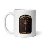 White mug with 'SHROOMFFEE' design featuring a mushroom and coffee cup on a white background