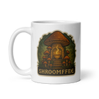 White mug with mushroom design and 'SHROOMFEE' text on a white background