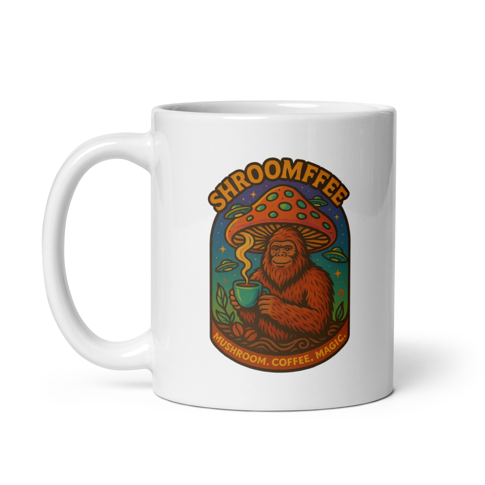 White mug with a colorful graphic of a mushroom and a bear holding a cup, labeled 'Shroomffee'.
