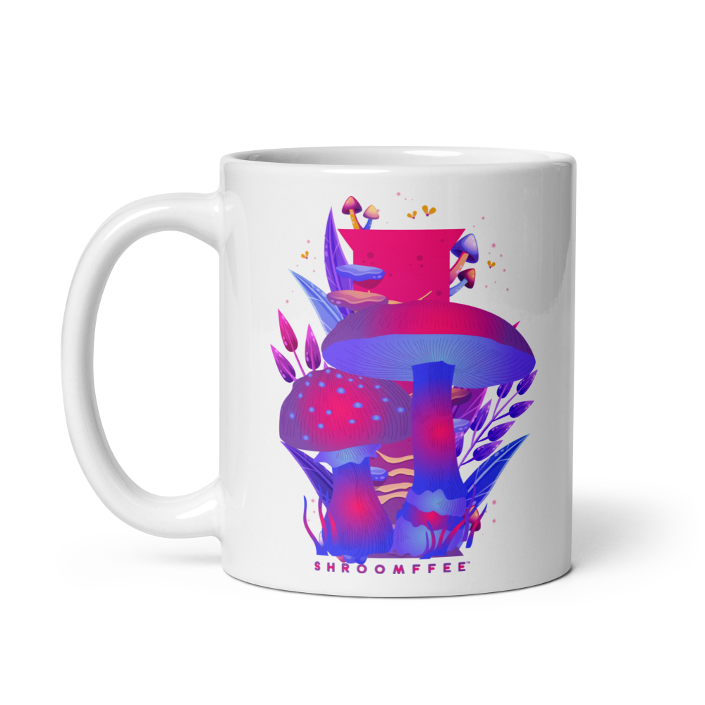 White mug with colorful mushroom design and 'SHROOMFEE' text on a white background