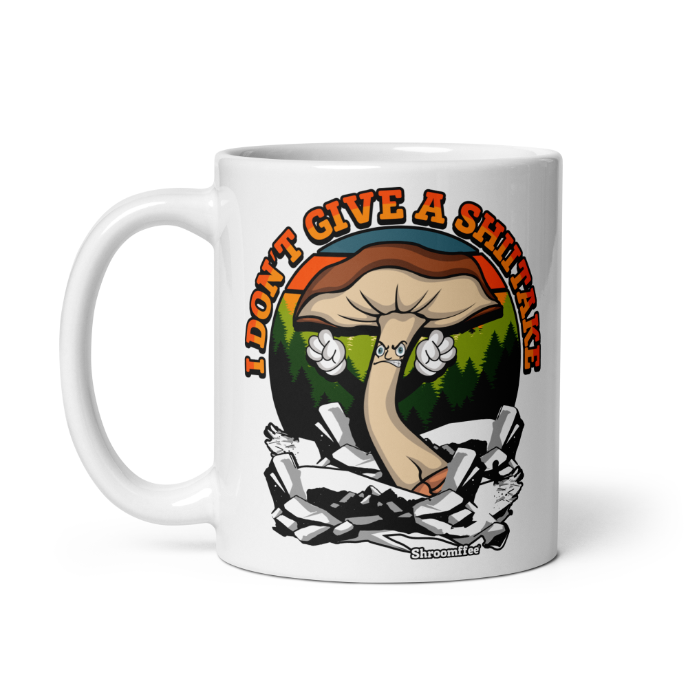Mug with mushroom graphic and text 'I Don't Give a Shroomake' on a white background