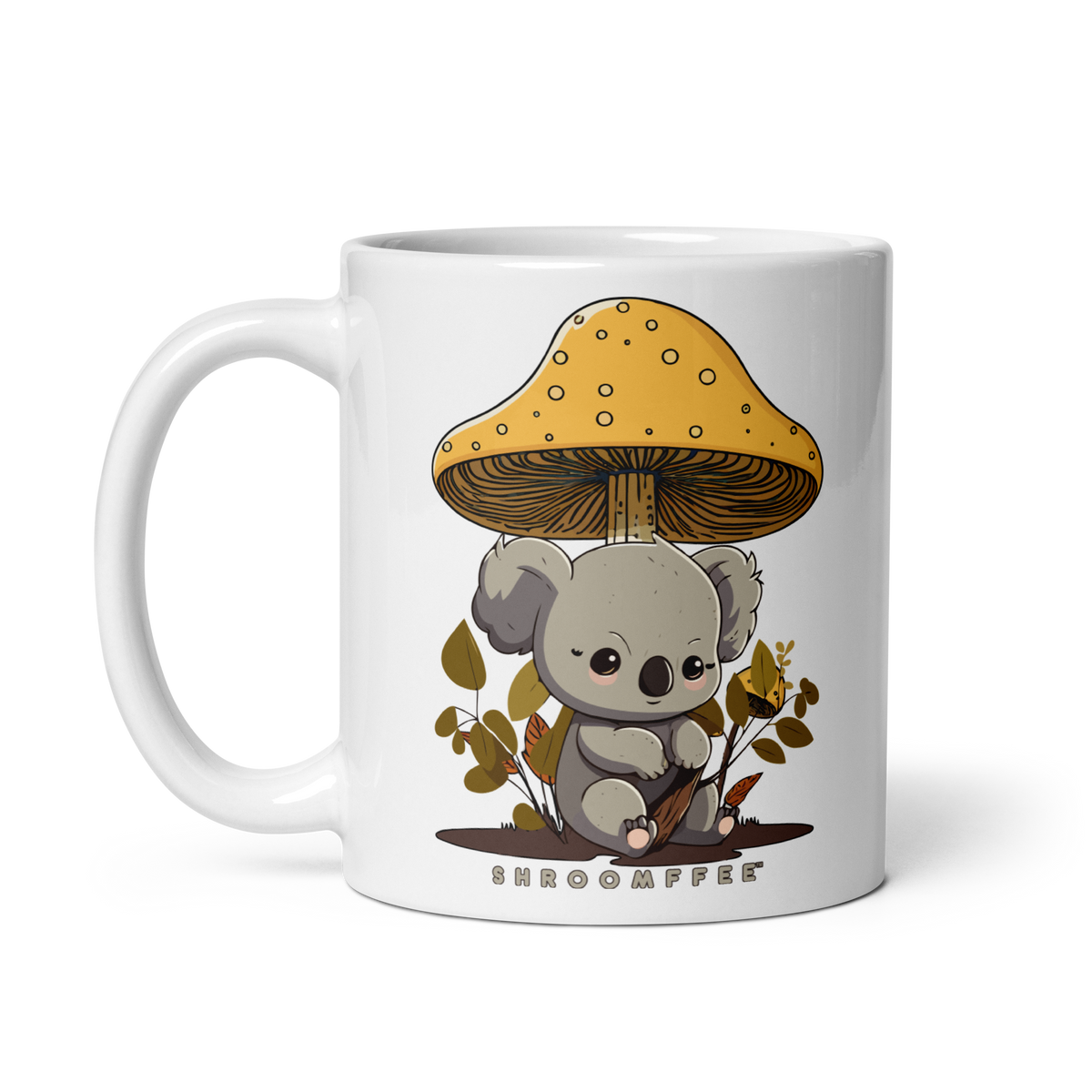 A white ceramic mug with a illustration of a koala bear under a golden mushroom with a 'SHROOMEEF' text on the front.