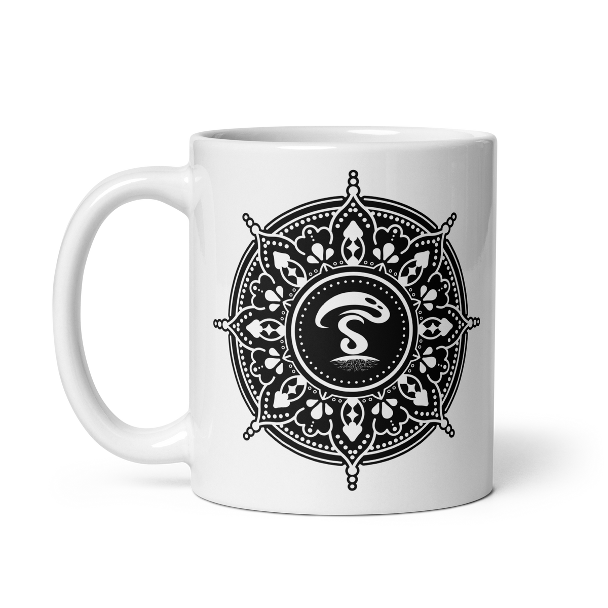 White ceramic mug with a black-and-white mandala design and a central insignia.