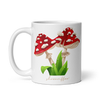 White mug with red mushroom design and 'shroomoffee' text on a white background